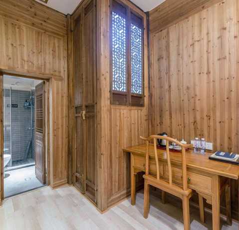 Imagen de la habitación del Hotel Floral Hotel Leisurely Life Wuyuan. Foto 14