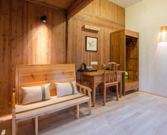 Imagen de la habitación del Hotel Floral Hotel Leisurely Life Wuyuan. Foto 15