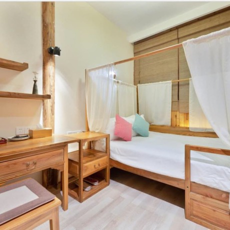 Imagen de la habitación del Hotel Floral Hotel Leisurely Life Wuyuan. Foto 16