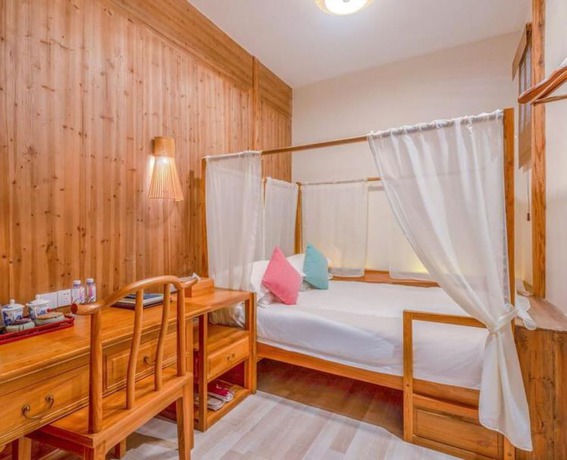 Imagen de la habitación del Hotel Floral Hotel Leisurely Life Wuyuan. Foto 17