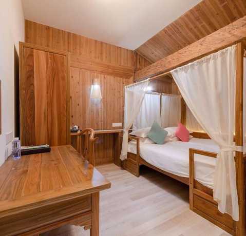 Imagen de la habitación del Hotel Floral Hotel Leisurely Life Wuyuan. Foto 18