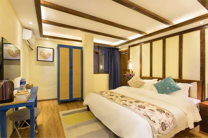 Imagen de la habitación del Hotel Floral Hotel Lijiang Exclusive Memory. Foto 3
