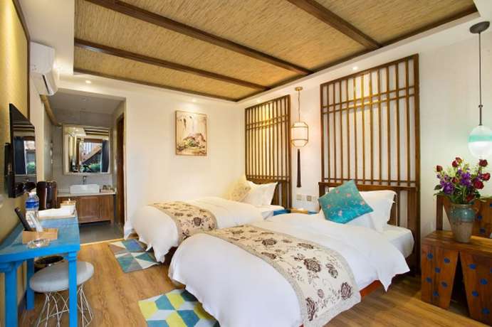Imagen de la habitación del Hotel Floral Hotel Lijiang Exclusive Memory. Foto 4
