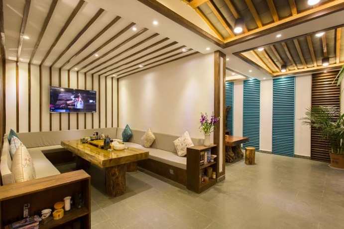 Imagen del bar/restaurante del Hotel Floral Hotel Lijiang Exclusive Memory. Foto 2