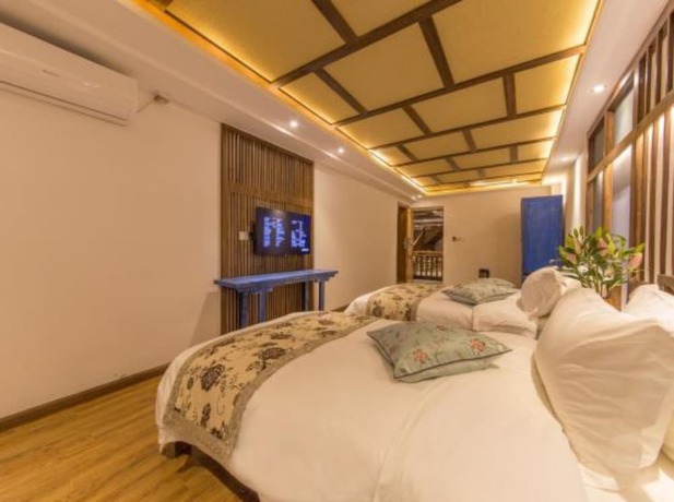 Imagen de la habitación del Hotel Floral Hotel Lijiang Exclusive Memory. Foto 6