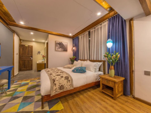Imagen de la habitación del Hotel Floral Hotel Lijiang Exclusive Memory. Foto 7