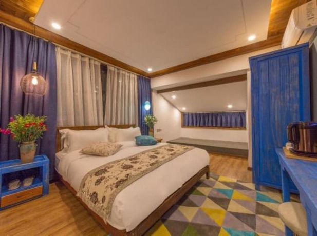 Imagen de la habitación del Hotel Floral Hotel Lijiang Exclusive Memory. Foto 9