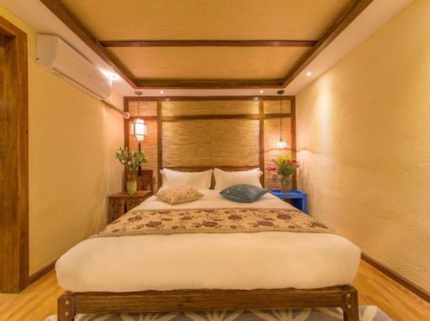 Imagen de la habitación del Hotel Floral Hotel Lijiang Exclusive Memory. Foto 11