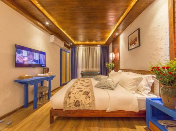 Imagen de la habitación del Hotel Floral Hotel Lijiang Exclusive Memory. Foto 12