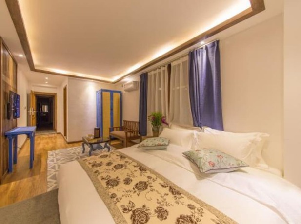 Imagen de la habitación del Hotel Floral Hotel Lijiang Exclusive Memory. Foto 16