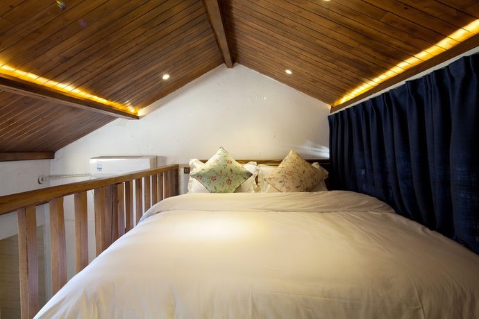 Imagen de la habitación del Hotel Floral Hotel Lijiang Exclusive Memory. Foto 17