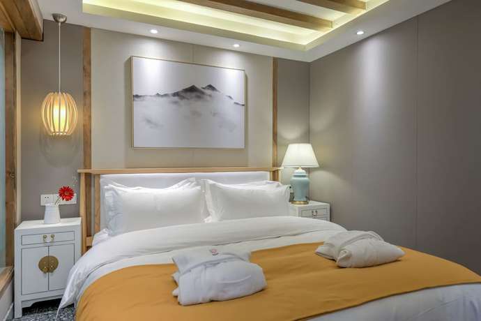 Imagen de la habitación del Hotel Floral Hotel Lijiang Huazizai. Foto 5
