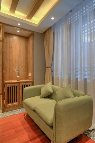 Imagen de la habitación del Hotel Floral Hotel Lijiang Huazizai. Foto 7