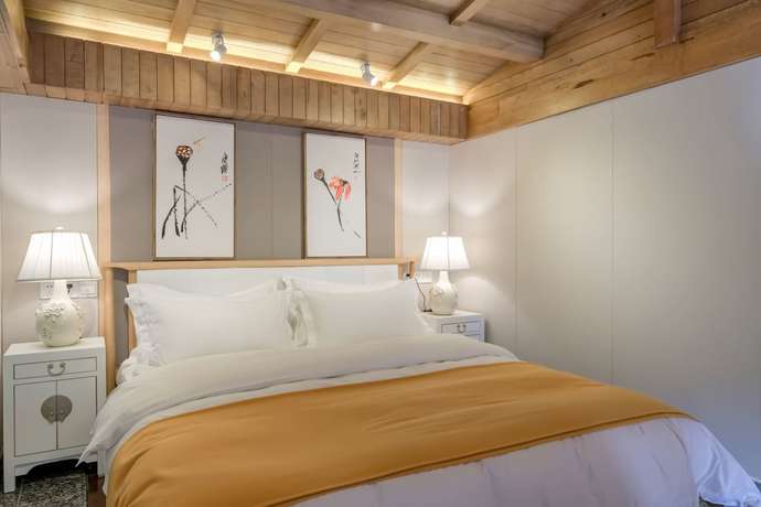 Imagen de la habitación del Hotel Floral Hotel Lijiang Huazizai. Foto 14