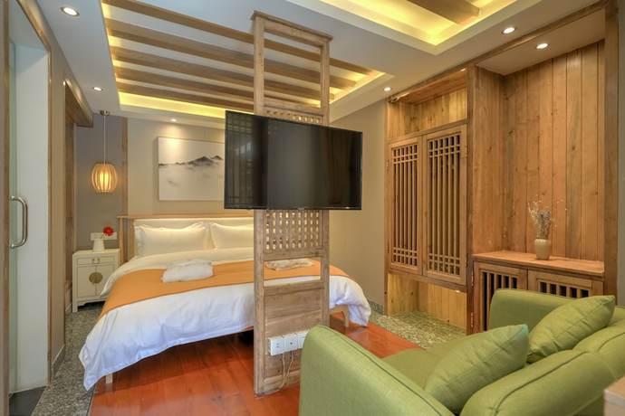 Imagen de la habitación del Hotel Floral Hotel Lijiang Huazizai. Foto 17