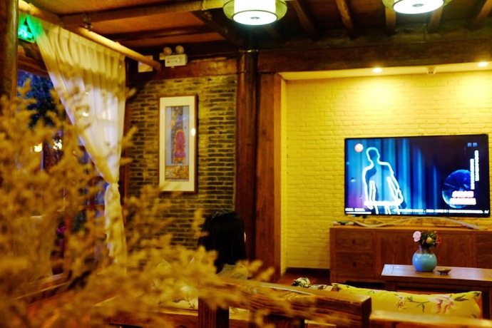 Imagen de los interiores del Hotel Floral Hotel Lijiang Mufu Qixi. Foto 19