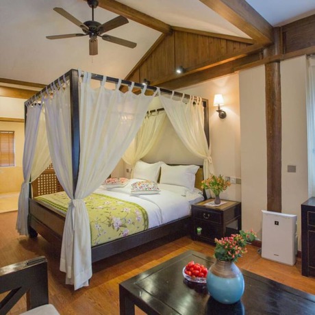 Imagen de la habitación del Hotel Floral Hotel Lijiang Mufu Qixi. Foto 6