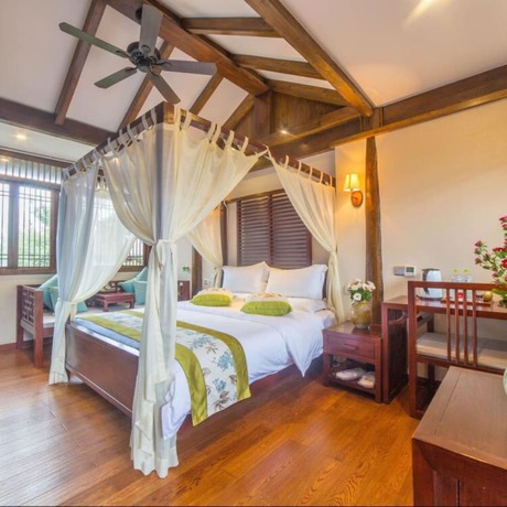 Imagen de la habitación del Hotel Floral Hotel Lijiang Mufu Qixi. Foto 8