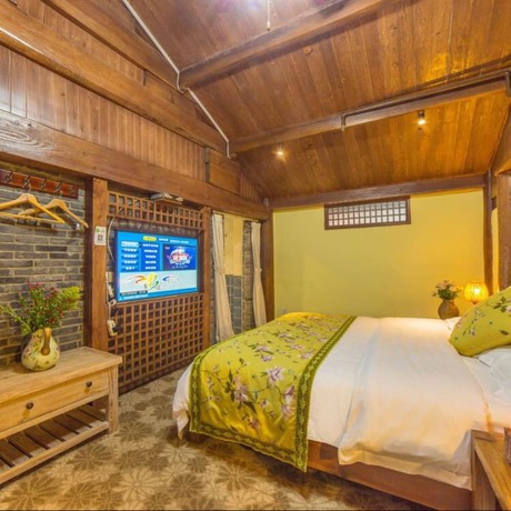 Imagen de la habitación del Hotel Floral Hotel Lijiang Mufu Qixi. Foto 11