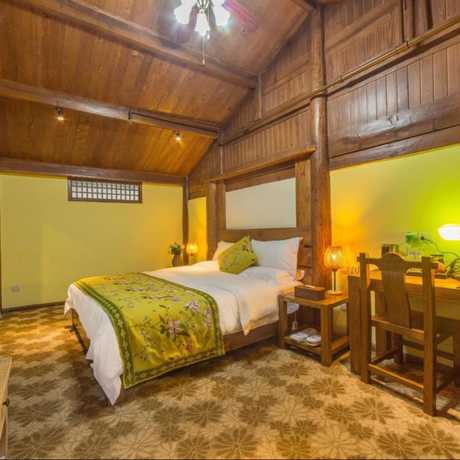 Imagen de la habitación del Hotel Floral Hotel Lijiang Mufu Qixi. Foto 12