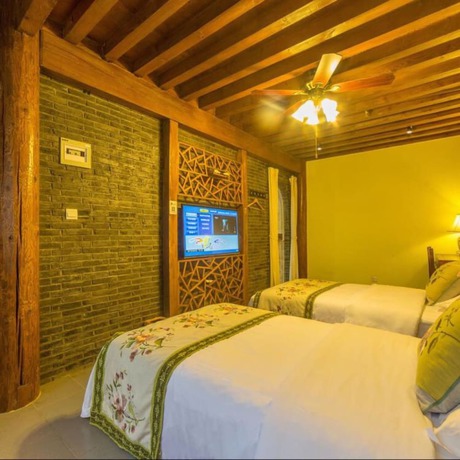 Imagen de la habitación del Hotel Floral Hotel Lijiang Mufu Qixi. Foto 18