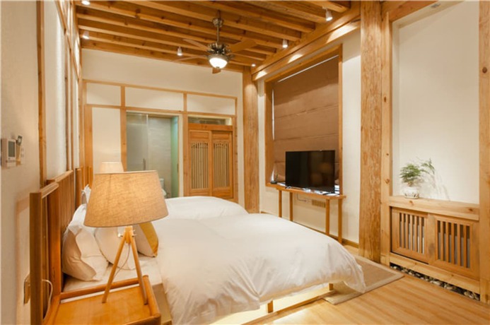 Imagen de la habitación del Hotel Floral Hotel Lijiang Nameiju. Foto 2
