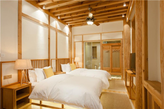 Imagen de la habitación del Hotel Floral Hotel Lijiang Nameiju. Foto 3