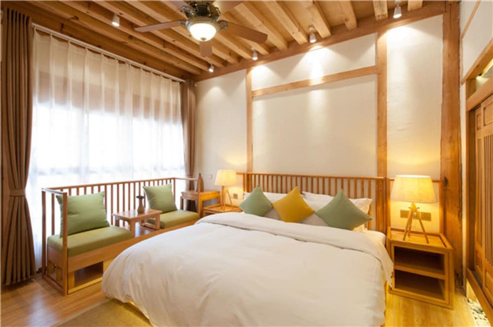 Imagen de la habitación del Hotel Floral Hotel Lijiang Nameiju. Foto 5