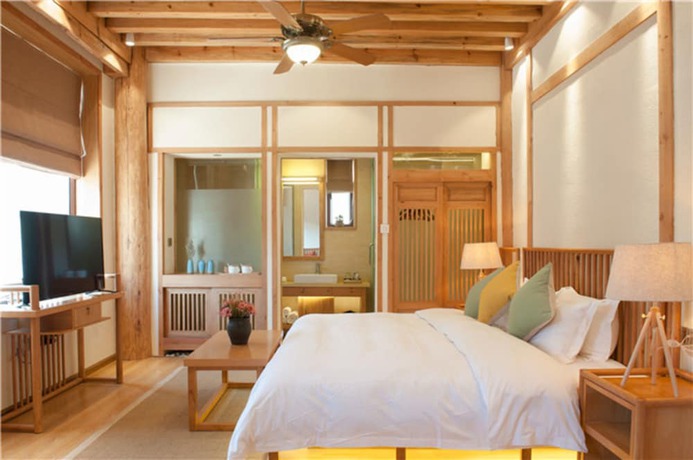 Imagen de la habitación del Hotel Floral Hotel Lijiang Nameiju. Foto 7