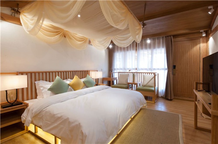 Imagen de la habitación del Hotel Floral Hotel Lijiang Nameiju. Foto 9