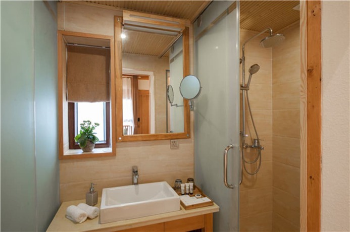 Imagen de la habitación del Hotel Floral Hotel Lijiang Nameiju. Foto 12