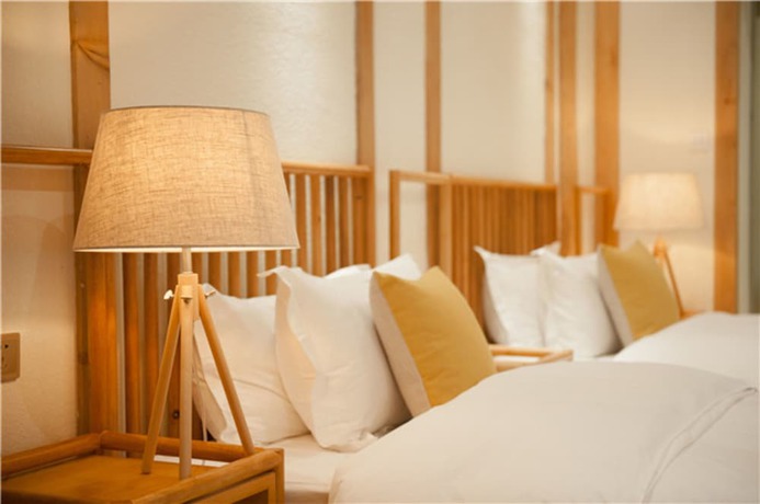 Imagen de la habitación del Hotel Floral Hotel Lijiang Nameiju. Foto 15