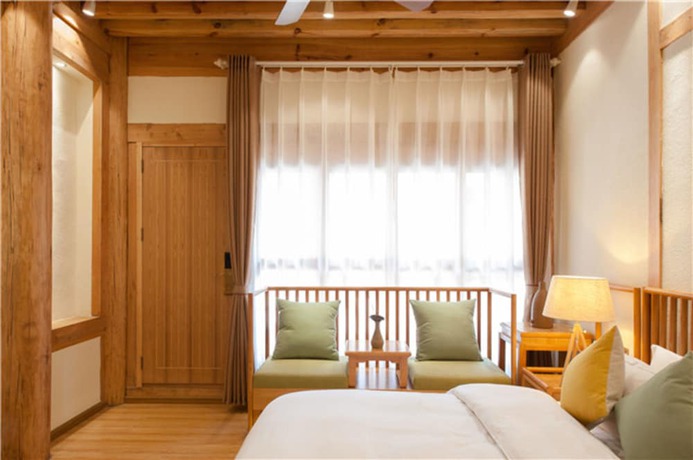 Imagen de la habitación del Hotel Floral Hotel Lijiang Nameiju. Foto 19