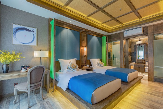 Imagen de la habitación del Hotel Floral Hotel Lijiang Qinyuan. Foto 2