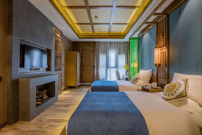 Imagen de la habitación del Hotel Floral Hotel Lijiang Qinyuan. Foto 4