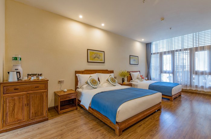 Imagen de la habitación del Hotel Floral Hotel Lijiang Qinyuan. Foto 6