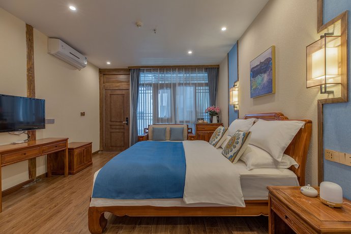 Imagen de la habitación del Hotel Floral Hotel Lijiang Qinyuan. Foto 7
