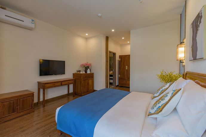 Imagen de la habitación del Hotel Floral Hotel Lijiang Qinyuan. Foto 15