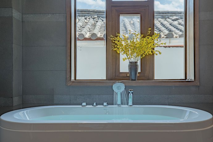 Imagen de la habitación del Hotel Floral Hotel Lijiang Qinyuan. Foto 17