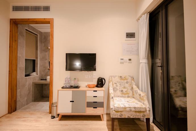 Imagen de la habitación del Hotel Floral Hotel Moganshan Cuiyu Resort. Foto 11