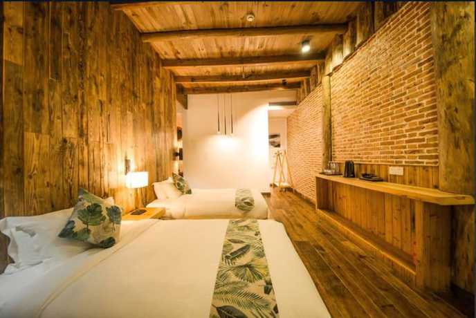 Imagen de la habitación del Hotel Floral Hotel Moganshan Cuiyu Resort. Foto 13