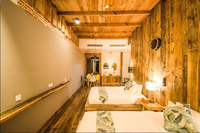 Imagen de la habitación del Hotel Floral Hotel Moganshan Cuiyu Resort. Foto 14