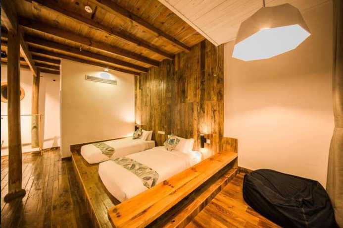 Imagen de la habitación del Hotel Floral Hotel Moganshan Cuiyu Resort. Foto 15