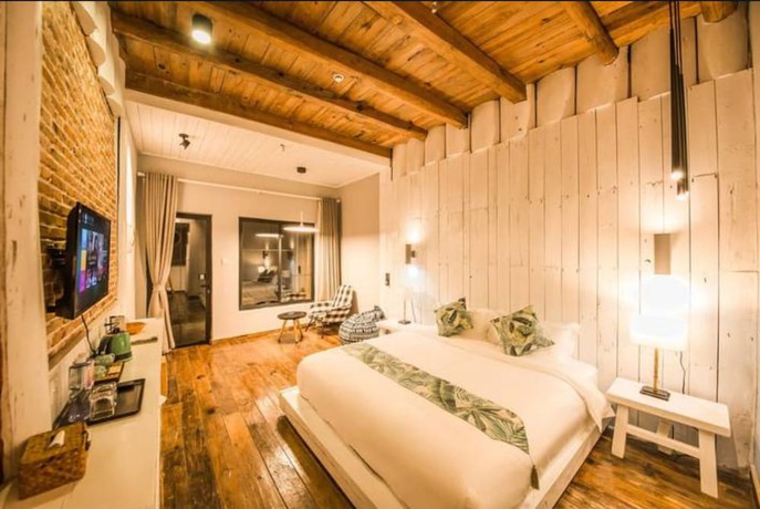 Imagen de la habitación del Hotel Floral Hotel Moganshan Cuiyu Resort. Foto 18