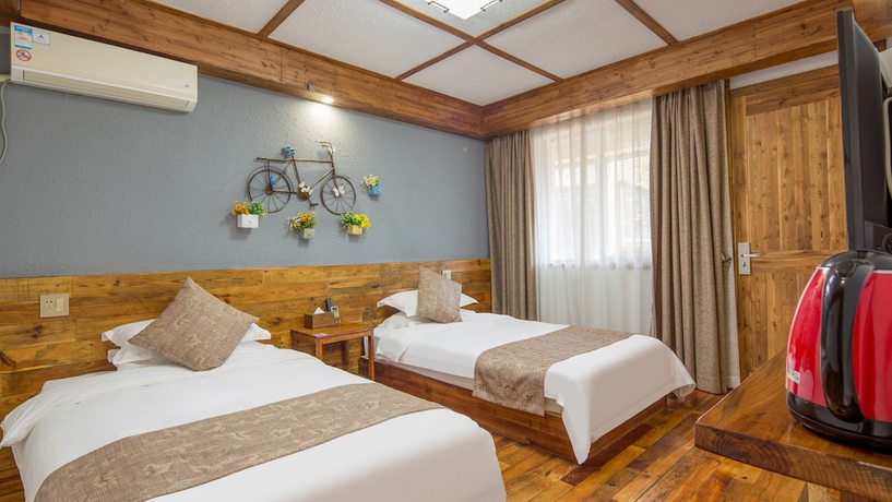 Imagen de la habitación del Hotel Floral Hotel Moganshan Tianquan. Foto 3