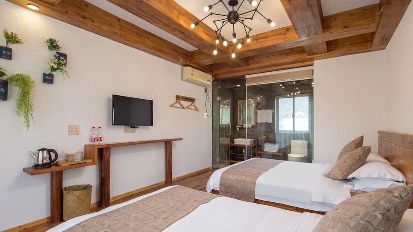 Imagen de la habitación del Hotel Floral Hotel Moganshan Tianquan. Foto 4