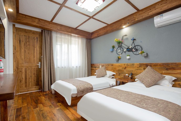 Imagen de la habitación del Hotel Floral Hotel Moganshan Tianquan. Foto 5