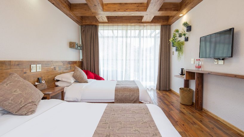 Imagen de la habitación del Hotel Floral Hotel Moganshan Tianquan. Foto 7