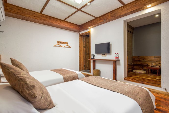 Imagen de la habitación del Hotel Floral Hotel Moganshan Tianquan. Foto 8