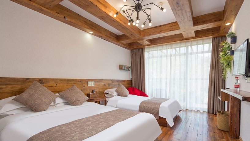 Imagen de la habitación del Hotel Floral Hotel Moganshan Tianquan. Foto 9